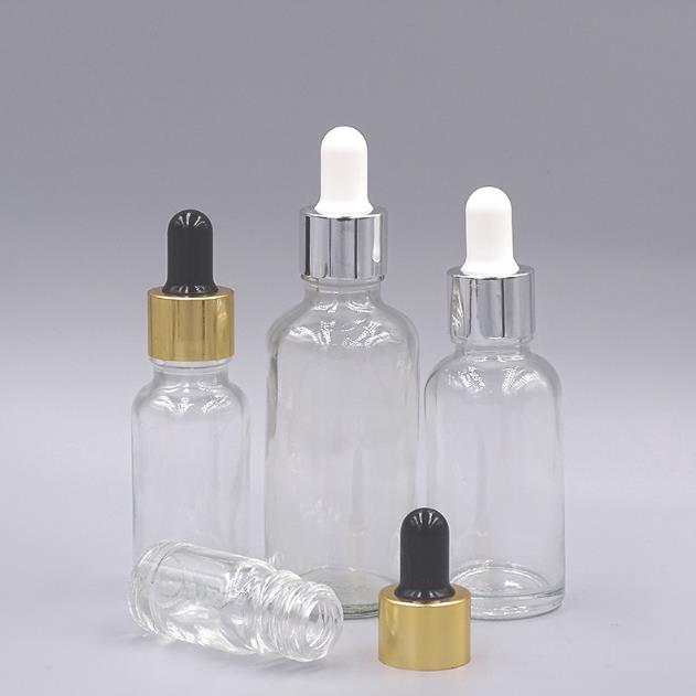 Clear bottle with metal dropper.jpg